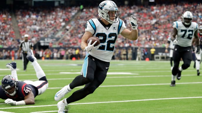 HOUSTON, TX - SEPTEMBER 29: Christian McCaffrey #22 of the Carolina Panthers runs past Carlos Watkins #91 of the Houston Texans in the second quarter at NRG Stadium on September 29, 2019 in Houston, Texas. (Photo by Tim Warner/Getty Images) HOUSTON, TX - SEPTEMBER 29: Christian McCaffrey #22 of the Carolina Panthers runs past Carlos Watkins #91 of the Houston Texans in the second quarter at NRG Stadium on September 29, 2019 in Houston, Texas. (Photo by Tim Warner/Getty Images)