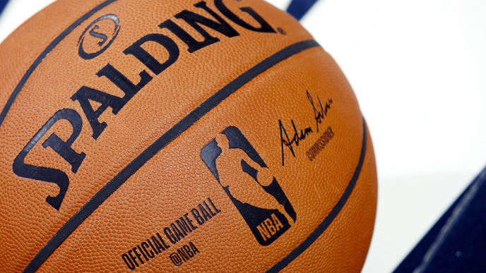 INDIANAPOLIS, IN - OCTOBER 11: A detail view of official Spalding NBA logo basketball on the floor during a preseason game between the Chicago Bulls and Indiana Pacers at Bankers Life Fieldhouse on October 11, 2019 in Indianapolis, Indiana. The Pacers defeated the Bulls 105-87. NOTE TO USER: User expressly acknowledges and agrees that, by downloading and or using this Photograph, user is consenting to the terms and conditions of the Getty Images License Agreement. (Photo by Joe Robbins/Getty Images) INDIANAPOLIS, IN - OCTOBER 11: A detail view of official Spalding NBA logo basketball on the floor during a preseason game between the Chicago Bulls and Indiana Pacers at Bankers Life Fieldhouse on October 11, 2019 in Indianapolis, Indiana. The Pacers defeated the Bulls 105-87. NOTE TO USER: User expressly acknowledges and agrees that, by downloading and or using this Photograph, user is consenting to the terms and conditions of the Getty Images License Agreement. (Photo by Joe Robbins/Getty Images)