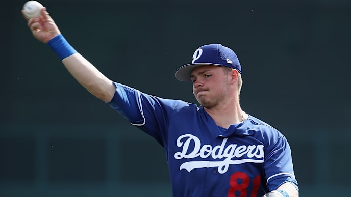 GLENDALE, ARIZONA - FEBRUARY 25: Gavin Lux #81 of the Los Angeles Dodgers warms up before the MLB spring training game against the Chicago Cubs at Camelback Ranch on February 25, 2019 in Glendale, Arizona. (Photo by Christian Petersen/Getty Images) GLENDALE, ARIZONA - FEBRUARY 25: Gavin Lux #81 of the Los Angeles Dodgers warms up before the MLB spring training game against the Chicago Cubs at Camelback Ranch on February 25, 2019 in Glendale, Arizona. (Photo by Christian Petersen/Getty Images)