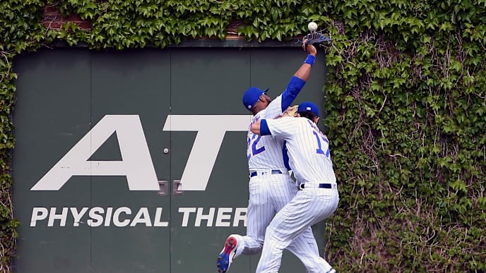 CHICAGO, ILLINOIS - MAY 26: Jason Heyward #22 and Kris Bryant #17 of the Chicago Cubs collided in the sixth inning trying to make a catch against the Cincinnati Reds at Wrigley Field on May 26, 2019 in Chicago, Illinois. (Photo by Quinn Harris/Getty Images) CHICAGO, ILLINOIS - MAY 26: Jason Heyward #22 and Kris Bryant #17 of the Chicago Cubs collided in the sixth inning trying to make a catch against the Cincinnati Reds at Wrigley Field on May 26, 2019 in Chicago, Illinois. (Photo by Quinn Harris/Getty Images)