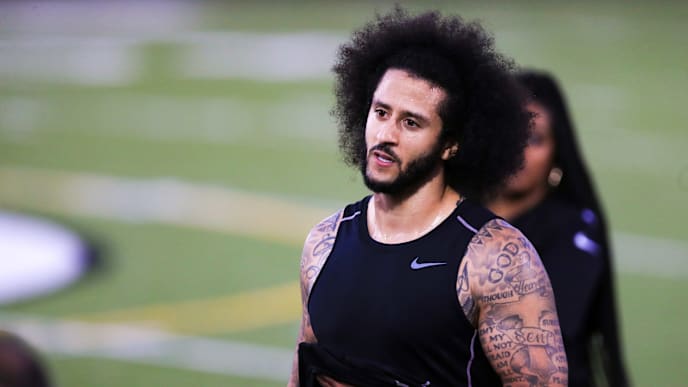 RIVERDALE, GA - NOVEMBER 16: Colin Kaepernick looks on during the Colin Kaepernick NFL workout held at Charles R. Drew High School on November 16, 2019 in Riverdale, Georgia. (Photo by Carmen Mandato/Getty Images) RIVERDALE, GA - NOVEMBER 16: Colin Kaepernick looks on during the Colin Kaepernick NFL workout held at Charles R. Drew High School on November 16, 2019 in Riverdale, Georgia. (Photo by Carmen Mandato/Getty Images)