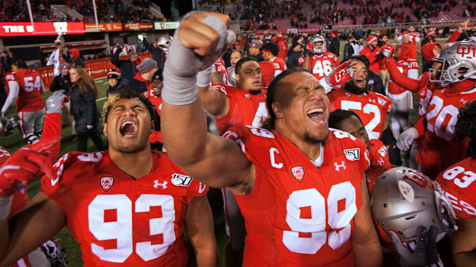 Utah College Football Team Celebrates Win. Utah College Football Team Celebrates Win.