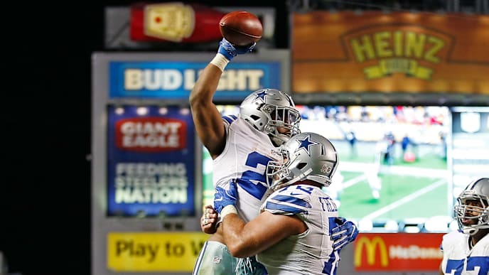PITTSBURGH, PA - NOVEMBER 13: Ezekiel Elliott #21 celebrates his 32-yard rushing touchdown with Travis Frederick #72 of the Dallas Cowboys in the fourth quarter during the game against the Pittsburgh Steelers at Heinz Field on November 13, 2016 in Pittsburgh, Pennsylvania. (Photo by Justin K. Aller/Getty Images) PITTSBURGH, PA - NOVEMBER 13: Ezekiel Elliott #21 celebrates his 32-yard rushing touchdown with Travis Frederick #72 of the Dallas Cowboys in the fourth quarter during the game against the Pittsburgh Steelers at Heinz Field on November 13, 2016 in Pittsburgh, Pennsylvania. (Photo by Justin K. Aller/Getty Images)