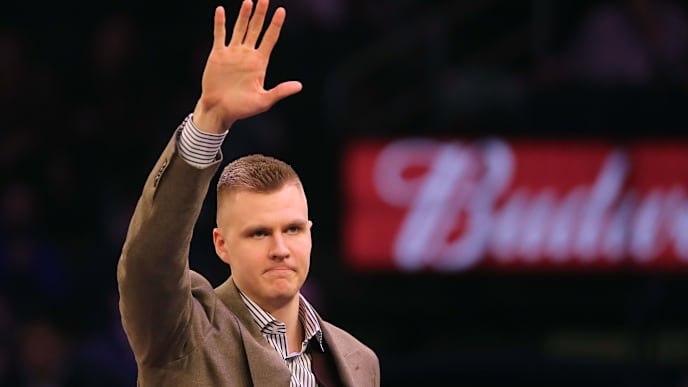 NEW YORK, NY - MARCH 13: (EDITOR'S NOTE: Alternate crop) Kristaps Porzingis of the New York Knicks is welcomed back after tearing his ACL previously in the season prior to taking on the Dallas Mavericks during their game at Madison Square Garden on March 13, 2018 in New York City. NOTE TO USER: User expressly acknowledges and agrees that, by downloading and or using this photograph, User is consenting to the terms and conditions of the Getty Images License Agreement. (Photo by Abbie Parr/Getty Images) NEW YORK, NY - MARCH 13: (EDITOR'S NOTE: Alternate crop) Kristaps Porzingis of the New York Knicks is welcomed back after tearing his ACL previously in the season prior to taking on the Dallas Mavericks during their game at Madison Square Garden on March 13, 2018 in New York City. NOTE TO USER: User expressly acknowledges and agrees that, by downloading and or using this photograph, User is consenting to the terms and conditions of the Getty Images License Agreement. (Photo by Abbie Parr/Getty Images)