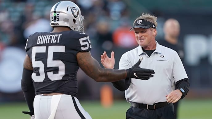 OAKLAND, CA - SEPTEMBER 09: Head coach Jon Gruden of the Oakland Raiders greets outside linebacker Vontaze Burfict #55 prior to their game against the Denver Broncos at RingCentral Coliseum on September 9, 2019 in Oakland, California. (Photo by Thearon W. Henderson/Getty Images) OAKLAND, CA - SEPTEMBER 09: Head coach Jon Gruden of the Oakland Raiders greets outside linebacker Vontaze Burfict #55 prior to their game against the Denver Broncos at RingCentral Coliseum on September 9, 2019 in Oakland, California. (Photo by Thearon W. Henderson/Getty Images)