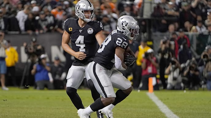 OAKLAND, CA - SEPTEMBER 09: Josh Jacobs #28 of the Oakland Raiders takes the handoff from quarterback Derek Carr #4 against the Denver Broncos during the second quarter of an NFL football game at RingCentral Coliseum on September 9, 2019 in Oakland, California. (Photo by Thearon W. Henderson/Getty Images) OAKLAND, CA - SEPTEMBER 09: Josh Jacobs #28 of the Oakland Raiders takes the handoff from quarterback Derek Carr #4 against the Denver Broncos during the second quarter of an NFL football game at RingCentral Coliseum on September 9, 2019 in Oakland, California. (Photo by Thearon W. Henderson/Getty Images)