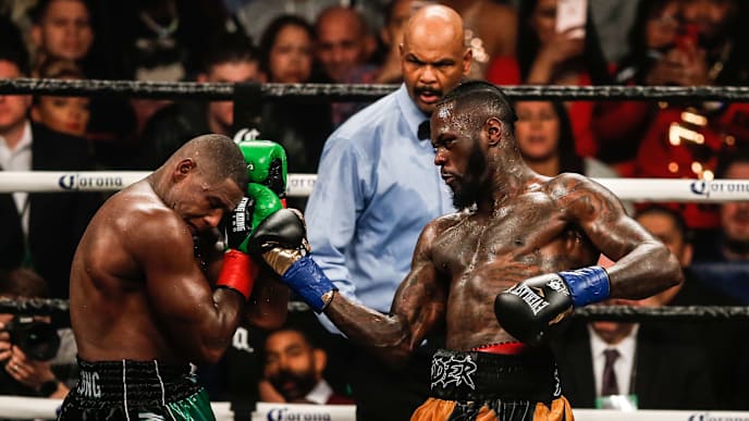 NEW YORK, NY - MARCH 03: Luis Ortiz (green shorts) and Deontay Wilder (yellow and black shorts) fight during their WBC Heavyweight Championship fight at Barclays Center on March 3, 2018 in the Brooklyn Borough of New York City. (Photo by Anthony Geathers/Getty Images) NEW YORK, NY - MARCH 03: Luis Ortiz (green shorts) and Deontay Wilder (yellow and black shorts) fight during their WBC Heavyweight Championship fight at Barclays Center on March 3, 2018 in the Brooklyn Borough of New York City. (Photo by Anthony Geathers/Getty Images)