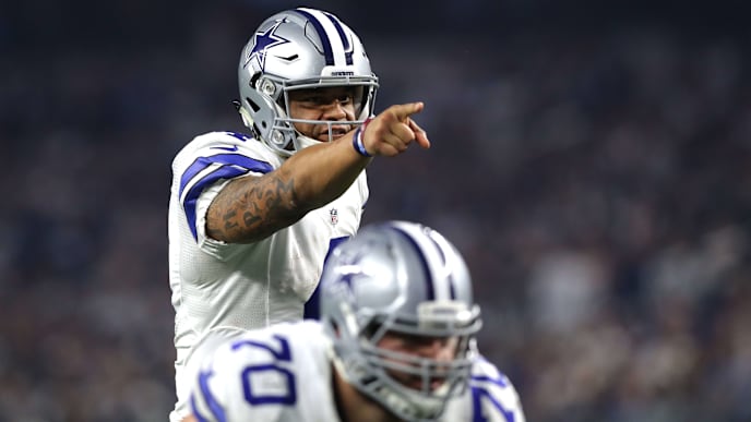 ARLINGTON, TX - DECEMBER 26: Dak Prescott #4 of the Dallas Cowboys points at the line of scrimmage as the Cowboys play the Detroit Lions during the second half at AT&T Stadium on December 26, 2016 in Arlington, Texas. (Photo by Ronald Martinez/Getty Images) ARLINGTON, TX - DECEMBER 26: Dak Prescott #4 of the Dallas Cowboys points at the line of scrimmage as the Cowboys play the Detroit Lions during the second half at AT&T Stadium on December 26, 2016 in Arlington, Texas. (Photo by Ronald Martinez/Getty Images)