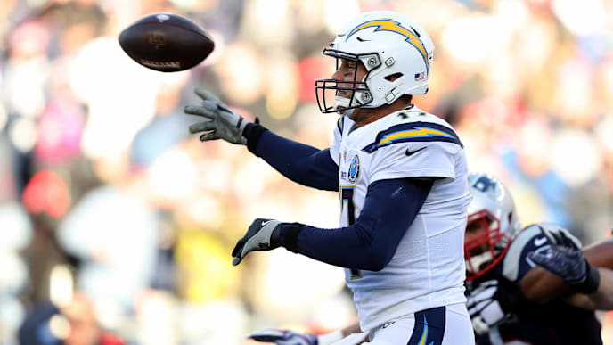 FOXBOROUGH, MASSACHUSETTS - JANUARY 13: Philip Rivers #17 of the Los Angeles Chargers throws the ball during the second quarter in the AFC Divisional Playoff Game against the New England Patriots at Gillette Stadium on January 13, 2019 in Foxborough, Massachusetts. (Photo by Elsa/Getty Images) FOXBOROUGH, MASSACHUSETTS - JANUARY 13: Philip Rivers #17 of the Los Angeles Chargers throws the ball during the second quarter in the AFC Divisional Playoff Game against the New England Patriots at Gillette Stadium on January 13, 2019 in Foxborough, Massachusetts. (Photo by Elsa/Getty Images)