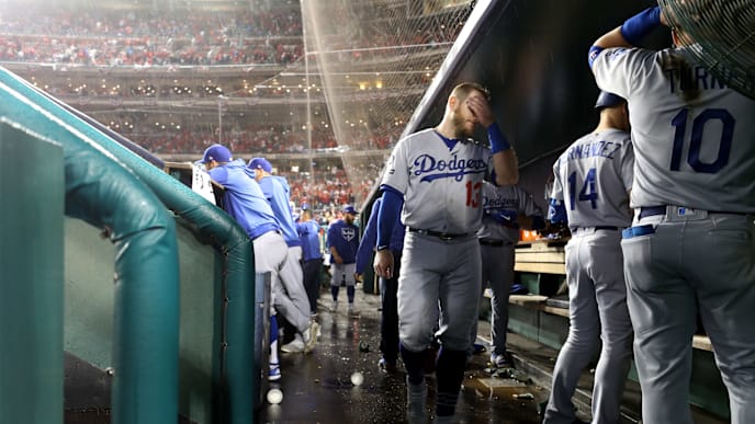 WASHINGTON, DC - OCTOBER 07: Max Muncy #13 of the Los Angeles Dodgers walks in the dug out during the eighth inning of game four of the National League Division Series against the Washington Nationals at Nationals Park on October 07, 2019 in Washington, DC. (Photo by Rob Carr/Getty Images) WASHINGTON, DC - OCTOBER 07: Max Muncy #13 of the Los Angeles Dodgers walks in the dug out during the eighth inning of game four of the National League Division Series against the Washington Nationals at Nationals Park on October 07, 2019 in Washington, DC. (Photo by Rob Carr/Getty Images)