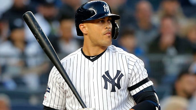 NEW YORK, NEW YORK - OCTOBER 05: (NEW YORK DAILIES OUT) Giancarlo Stanton #27 of the New York Yankees in action against the Minnesota Twins in game two of the American League Division Series at Yankee Stadium on October 05, 2019 in New York City. The Yankees defeated the Twins 8-2. (Photo by Jim McIsaac/Getty Images) NEW YORK, NEW YORK - OCTOBER 05: (NEW YORK DAILIES OUT) Giancarlo Stanton #27 of the New York Yankees in action against the Minnesota Twins in game two of the American League Division Series at Yankee Stadium on October 05, 2019 in New York City. The Yankees defeated the Twins 8-2. (Photo by Jim McIsaac/Getty Images)
