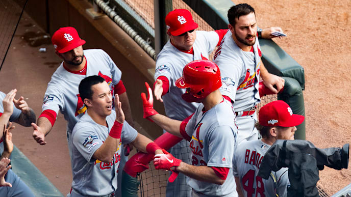 ATLANTA, GA - OCTOBER 09: Jack Flaherty #22 of the St. Louis Cardinals high fives teammates in the dugout during Game Five of the National League Division Series against the Atlanta Braves at SunTrust Park on October 9, 2019 in Atlanta, Georgia. (Photo by Carmen Mandato/Getty Images) ATLANTA, GA - OCTOBER 09: Jack Flaherty #22 of the St. Louis Cardinals high fives teammates in the dugout during Game Five of the National League Division Series against the Atlanta Braves at SunTrust Park on October 9, 2019 in Atlanta, Georgia. (Photo by Carmen Mandato/Getty Images)