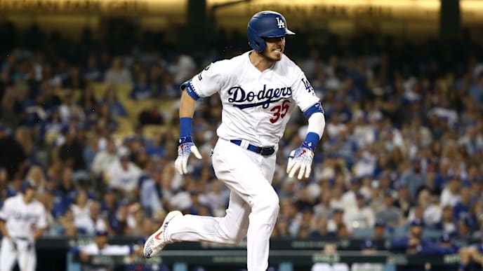 LOS ANGELES, CALIFORNIA - OCTOBER 09: Cody Bellinger #35 of the Los Angeles Dodgers runs to first on an error in the third inning of game five of the National League Division Series against the Washington Nationals at Dodger Stadium on October 09, 2019 in Los Angeles, California. (Photo by Sean M. Haffey/Getty Images) LOS ANGELES, CALIFORNIA - OCTOBER 09: Cody Bellinger #35 of the Los Angeles Dodgers runs to first on an error in the third inning of game five of the National League Division Series against the Washington Nationals at Dodger Stadium on October 09, 2019 in Los Angeles, California. (Photo by Sean M. Haffey/Getty Images)