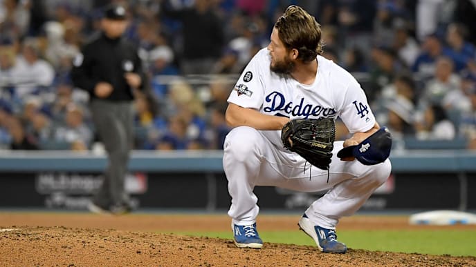 LOS ANGELES, CALIFORNIA - OCTOBER 09: Clayton Kershaw #22 of the Los Angeles Dodgers reacts after giving up a solo home run to Juan Soto #22 of the Washington Nationals in the eighth inning of game five of the National League Division Series, to tie the game 3-3, at Dodger Stadium on October 09, 2019 in Los Angeles, California. (Photo by Harry How/Getty Images) LOS ANGELES, CALIFORNIA - OCTOBER 09: Clayton Kershaw #22 of the Los Angeles Dodgers reacts after giving up a solo home run to Juan Soto #22 of the Washington Nationals in the eighth inning of game five of the National League Division Series, to tie the game 3-3, at Dodger Stadium on October 09, 2019 in Los Angeles, California. (Photo by Harry How/Getty Images)