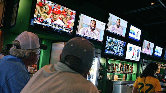 BOCA RATON, FL - JULY 08: LeBron James announces he will join the Miami Heat during a televised interview as fans look on at Duffy's July 8, 2010 in Boca Raton, Florida. (Photo by Marc Serota/Getty Images) BOCA RATON, FL - JULY 08: LeBron James announces he will join the Miami Heat during a televised interview as fans look on at Duffy's July 8, 2010 in Boca Raton, Florida. (Photo by Marc Serota/Getty Images)