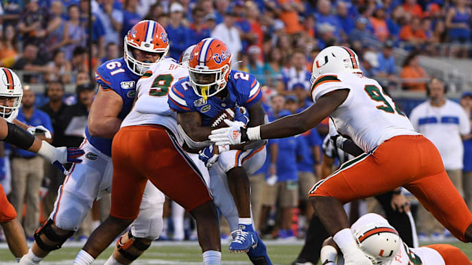 ORLANDO, FL - AUGUST 24: Lamical Perine #2 of the Florida Gators runs with the ball in the first half against the Miami Hurricanes in the Camping World Kickoff at Camping World Stadium on August 24, 2019 in Orlando, Florida.(Photo by Mark Brown/Getty Images) ORLANDO, FL - AUGUST 24: Lamical Perine #2 of the Florida Gators runs with the ball in the first half against the Miami Hurricanes in the Camping World Kickoff at Camping World Stadium on August 24, 2019 in Orlando, Florida.(Photo by Mark Brown/Getty Images)