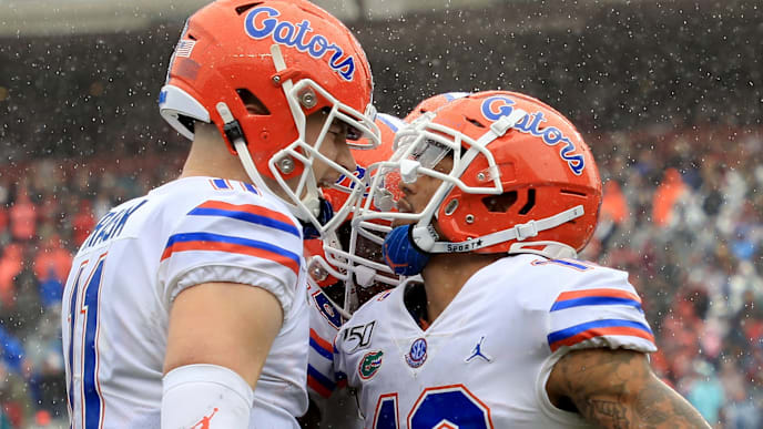 COLUMBIA, SOUTH CAROLINA - OCTOBER 19: Teammates Kyle Trask #11 and Freddie Swain #16 of the Florida Gators celebrate after a touchdown against the South Carolina Gamecocks during their game at Williams-Brice Stadium on October 19, 2019 in Columbia, South Carolina. (Photo by Streeter Lecka/Getty Images) COLUMBIA, SOUTH CAROLINA - OCTOBER 19: Teammates Kyle Trask #11 and Freddie Swain #16 of the Florida Gators celebrate after a touchdown against the South Carolina Gamecocks during their game at Williams-Brice Stadium on October 19, 2019 in Columbia, South Carolina. (Photo by Streeter Lecka/Getty Images)