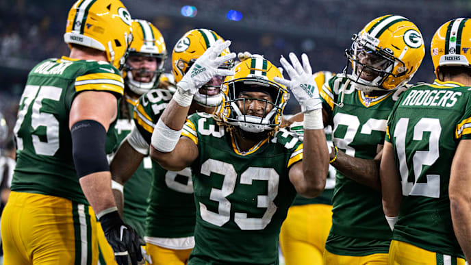 ARLINGTON, TX - OCTOBER 6: Aaron Jones #33 of the Green Bay Packers celebrates after scoring his fourth touchdown during a game against the Dallas Cowboys at AT&T Stadium on October 6, 2019 in Arlington, Texas. (Photo by Wesley Hitt/Getty Images) ARLINGTON, TX - OCTOBER 6: Aaron Jones #33 of the Green Bay Packers celebrates after scoring his fourth touchdown during a game against the Dallas Cowboys at AT&T Stadium on October 6, 2019 in Arlington, Texas. (Photo by Wesley Hitt/Getty Images)