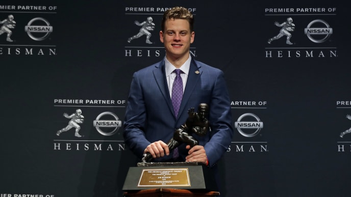 LSU quarterback Joe Burrow poses for a photo after winning the 2019 Heisman Trophy. LSU quarterback Joe Burrow poses for a photo after winning the 2019 Heisman Trophy.