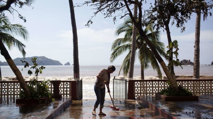 MELAQUE, MEXICO - OCTOBER 24: A worker cleans out the 'Monterey' Hotel after damage from Hurricane Patricia October 24, 2015 in Melaque, Jalisco, Mexico. Hurricane Patricia struck Mexico's West coast as the most powerful storm ever recorded in the Western Hemisphere but rapidly lost energy as it moved inland. (Photo by Brett Gundlock/Getty Images) MELAQUE, MEXICO - OCTOBER 24: A worker cleans out the 'Monterey' Hotel after damage from Hurricane Patricia October 24, 2015 in Melaque, Jalisco, Mexico. Hurricane Patricia struck Mexico's West coast as the most powerful storm ever recorded in the Western Hemisphere but rapidly lost energy as it moved inland. (Photo by Brett Gundlock/Getty Images)