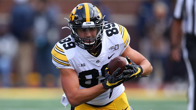 ANN ARBOR, MICHIGAN - OCTOBER 05: Nico Ragaini #89 of the Iowa Hawkeyes tries to escape the tackle by Jordan Glasgow #29 of the Michigan Wolverines at Michigan Stadium on October 05, 2019 in Ann Arbor, Michigan. Michigan won the game 10-3. (Photo by Gregory Shamus/Getty Images) ANN ARBOR, MICHIGAN - OCTOBER 05: Nico Ragaini #89 of the Iowa Hawkeyes tries to escape the tackle by Jordan Glasgow #29 of the Michigan Wolverines at Michigan Stadium on October 05, 2019 in Ann Arbor, Michigan. Michigan won the game 10-3. (Photo by Gregory Shamus/Getty Images)