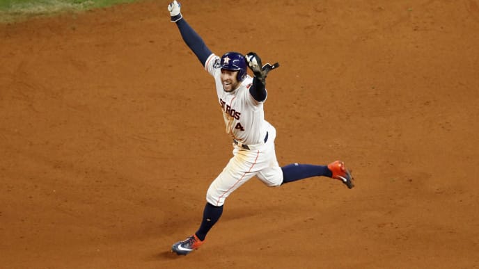 HOUSTON, TX - OCTOBER 19: George Springer #4 of the Houston Astros celebrates as he runs the bases after a walk-off home run by Jose Altuve #27 in the ninth inning against the New York Yankees during Game Six of the League Championship Series at Minute Maid Park on October 19, 2019 in Houston, Texas. (Photo by Tim Warner/Getty Images) HOUSTON, TX - OCTOBER 19: George Springer #4 of the Houston Astros celebrates as he runs the bases after a walk-off home run by Jose Altuve #27 in the ninth inning against the New York Yankees during Game Six of the League Championship Series at Minute Maid Park on October 19, 2019 in Houston, Texas. (Photo by Tim Warner/Getty Images)