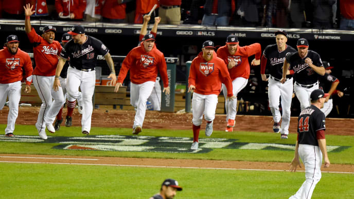 WASHINGTON, DC - OCTOBER 15: The Washington Nationals bench runs on to the field after defeating the St. Louis Cardinals for Game Four of the National League Championship Series at Nationals Park on October 15, 2019 in Washington, DC. (Photo by Will Newton/Getty Images) WASHINGTON, DC - OCTOBER 15: The Washington Nationals bench runs on to the field after defeating the St. Louis Cardinals for Game Four of the National League Championship Series at Nationals Park on October 15, 2019 in Washington, DC. (Photo by Will Newton/Getty Images)