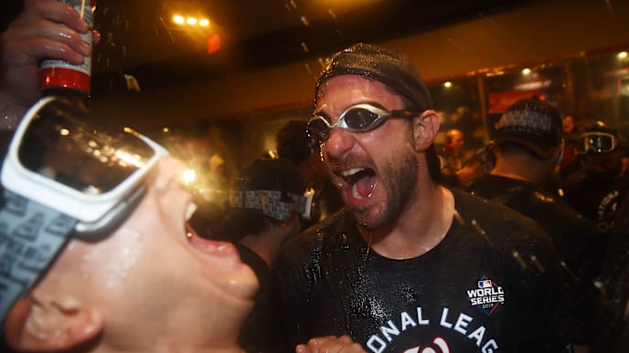 WASHINGTON, DC - OCTOBER 15: Max Scherzer #31 of the Washington Nationals celebrates with teammates in the clubhouse after they won game four and the National League Championship Series against the St. Louis Cardinals at Nationals Park on October 15, 2019 in Washington, DC. (Photo by Will Newton/Getty Images) WASHINGTON, DC - OCTOBER 15: Max Scherzer #31 of the Washington Nationals celebrates with teammates in the clubhouse after they won game four and the National League Championship Series against the St. Louis Cardinals at Nationals Park on October 15, 2019 in Washington, DC. (Photo by Will Newton/Getty Images)