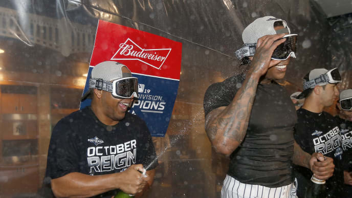 NEW YORK, NEW YORK - SEPTEMBER 19: Edwin Encarnacion #30 and Aroldis Chapman #54 of the New York Yankees celebrate after the New York Yankees clinched the American League East division title at Yankee Stadium on September 19, 2019 in Bronx borough of New York City. (Photo by Elsa/Getty Images) NEW YORK, NEW YORK - SEPTEMBER 19: Edwin Encarnacion #30 and Aroldis Chapman #54 of the New York Yankees celebrate after the New York Yankees clinched the American League East division title at Yankee Stadium on September 19, 2019 in Bronx borough of New York City. (Photo by Elsa/Getty Images)