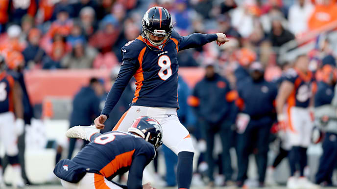 DENVER, COLORADO - DECEMBER 01: Colby Wadman #6 holds as Brandon McManus #8 of the Denver Broncos kicks a field goal against the Los Angeles Chargers in the second quarter at Empower Field at Mile High on December 01, 2019 in Denver, Colorado. (Photo by Matthew Stockman/Getty Images) DENVER, COLORADO - DECEMBER 01: Colby Wadman #6 holds as Brandon McManus #8 of the Denver Broncos kicks a field goal against the Los Angeles Chargers in the second quarter at Empower Field at Mile High on December 01, 2019 in Denver, Colorado. (Photo by Matthew Stockman/Getty Images)