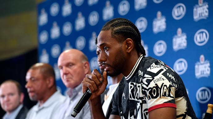 LOS ANGELES, CA - JULY 24: Kawhi Leonard speaks during his introductory news conference at Green Meadows Recreation Center on July 24, 2019 in Los Angeles, California. NOTE TO USER: User expressly acknowledges and agrees that, by downloading and or using this photograph, User is consenting to the terms and conditions of the Getty Images License Agreement. at Green Meadows Recreation Center on July 24, 2019 in Los Angeles, California. (Photo by Kevork Djansezian/Getty Images) LOS ANGELES, CA - JULY 24: Kawhi Leonard speaks during his introductory news conference at Green Meadows Recreation Center on July 24, 2019 in Los Angeles, California. NOTE TO USER: User expressly acknowledges and agrees that, by downloading and or using this photograph, User is consenting to the terms and conditions of the Getty Images License Agreement. at Green Meadows Recreation Center on July 24, 2019 in Los Angeles, California. (Photo by Kevork Djansezian/Getty Images)