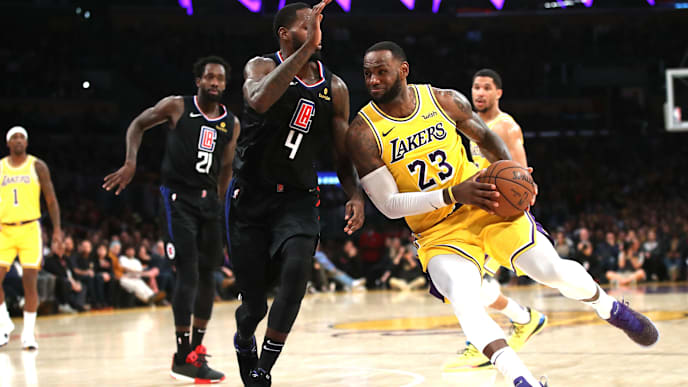 LOS ANGELES, CALIFORNIA - MARCH 04: LeBron James #23 of the Los Angeles Lakers dribbles past JaMychal Green #4 of the Los Angeles Clippers during the second half of a game against the Los Angeles Clippers at Staples Center on March 04, 2019 in Los Angeles, California. The Los Angeles Clippers defeated the Los Angeles Lakers 113-105. (Photo by Sean M. Haffey/Getty Images) LOS ANGELES, CALIFORNIA - MARCH 04: LeBron James #23 of the Los Angeles Lakers dribbles past JaMychal Green #4 of the Los Angeles Clippers during the second half of a game against the Los Angeles Clippers at Staples Center on March 04, 2019 in Los Angeles, California. The Los Angeles Clippers defeated the Los Angeles Lakers 113-105. (Photo by Sean M. Haffey/Getty Images)