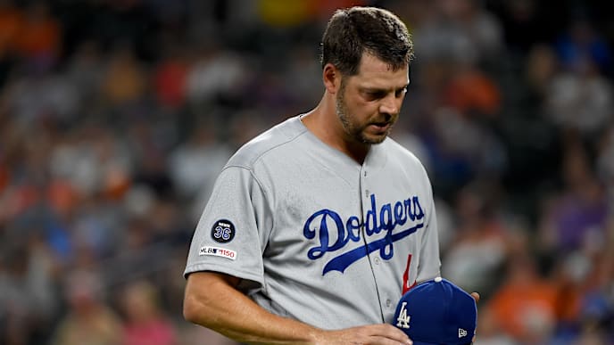 BALTIMORE, MD - SEPTEMBER 12: Rich Hill #44 of the Los Angeles Dodgers walks off the field after being pulled during the first inning against the Baltimore Orioles at Oriole Park at Camden Yards on September 12, 2019 in Baltimore, Maryland. (Photo by Will Newton/Getty Images) BALTIMORE, MD - SEPTEMBER 12: Rich Hill #44 of the Los Angeles Dodgers walks off the field after being pulled during the first inning against the Baltimore Orioles at Oriole Park at Camden Yards on September 12, 2019 in Baltimore, Maryland. (Photo by Will Newton/Getty Images)