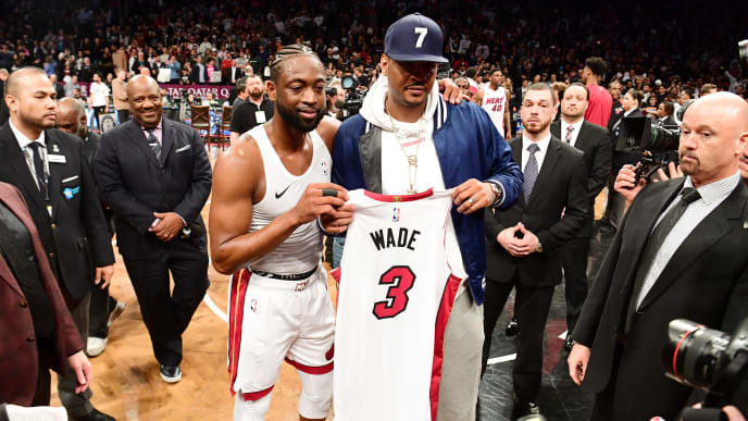 NEW YORK, NEW YORK - APRIL 10: Dwyane Wade #3 of the Miami Heat gives his jersey to former NBA player Carmelo Anthony after the game against the Brooklyn Nets at Barclays Center on April 10, 2019 in the Brooklyn borough of New York City. This was Wade's last NBA game before retirement. NOTE TO USER: User expressly acknowledges and agrees that, by downloading and or using this photograph, User is consenting to the terms and conditions of the Getty Images License Agreement.(Photo by Sarah Stier/Getty Images) NEW YORK, NEW YORK - APRIL 10: Dwyane Wade #3 of the Miami Heat gives his jersey to former NBA player Carmelo Anthony after the game against the Brooklyn Nets at Barclays Center on April 10, 2019 in the Brooklyn borough of New York City. This was Wade's last NBA game before retirement. NOTE TO USER: User expressly acknowledges and agrees that, by downloading and or using this photograph, User is consenting to the terms and conditions of the Getty Images License Agreement.(Photo by Sarah Stier/Getty Images)
