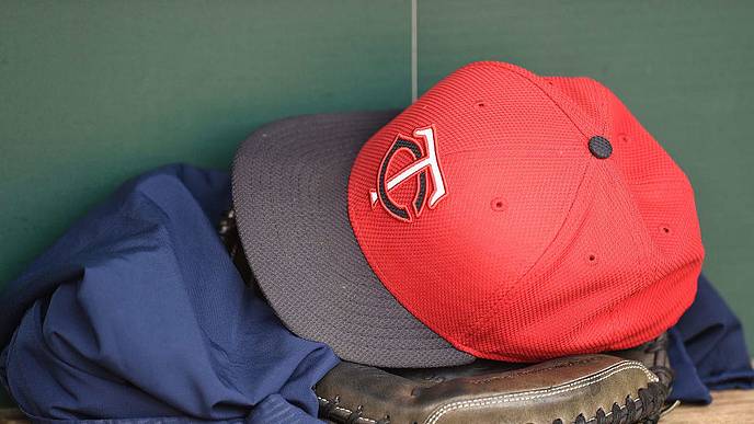 BALTIMORE, MD - AUGUST 20: A Minnesota Twins cap and glove in the dug out before a baseball game against the Baltimore Orioles at Oriole Park at Camden Yards at on August 20, 2015 in Baltimore, Maryland. (Photo by Mitchell Layton/Getty Images) BALTIMORE, MD - AUGUST 20: A Minnesota Twins cap and glove in the dug out before a baseball game against the Baltimore Orioles at Oriole Park at Camden Yards at on August 20, 2015 in Baltimore, Maryland. (Photo by Mitchell Layton/Getty Images)