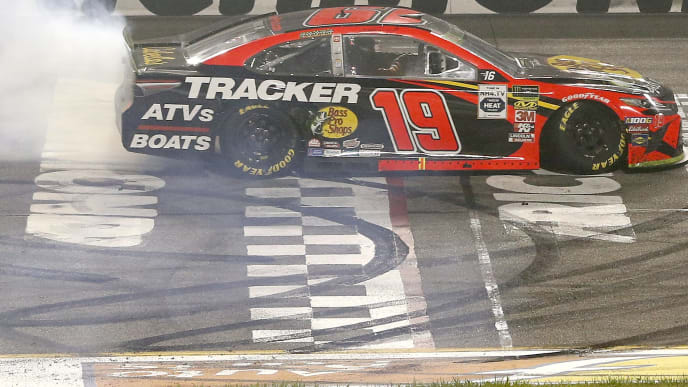 RICHMOND, VIRGINIA - SEPTEMBER 21: Martin Truex Jr., driver of the #19 Bass Pro Shops Toyota, celebrates with a burnout after winning the Monster Energy NASCAR Cup Series Federated Auto Parts 400 at Richmond Raceway on September 21, 2019 in Richmond, Virginia. (Photo by Brian Lawdermilk/Getty Images) RICHMOND, VIRGINIA - SEPTEMBER 21: Martin Truex Jr., driver of the #19 Bass Pro Shops Toyota, celebrates with a burnout after winning the Monster Energy NASCAR Cup Series Federated Auto Parts 400 at Richmond Raceway on September 21, 2019 in Richmond, Virginia. (Photo by Brian Lawdermilk/Getty Images)