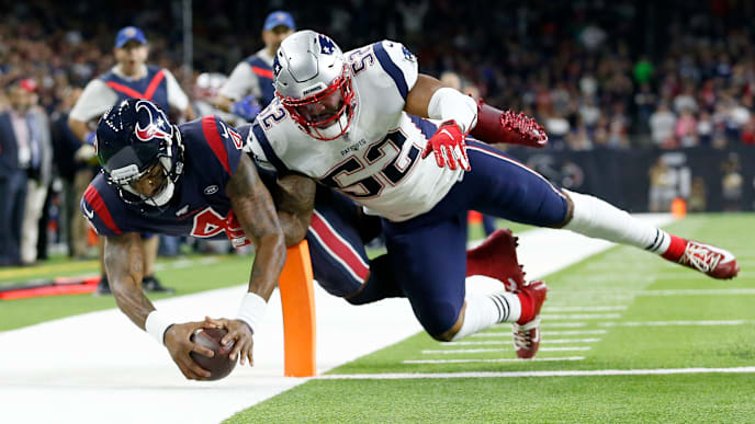 HOUSTON, TEXAS - DECEMBER 01: Deshaun Watson #4 of the Houston Texans scores a touchdown against Elandon Roberts #52 of the New England Patriots during the fourth quarter in the game at NRG Stadium on December 01, 2019 in Houston, Texas. (Photo by Tim Warner/Getty Images) HOUSTON, TEXAS - DECEMBER 01: Deshaun Watson #4 of the Houston Texans scores a touchdown against Elandon Roberts #52 of the New England Patriots during the fourth quarter in the game at NRG Stadium on December 01, 2019 in Houston, Texas. (Photo by Tim Warner/Getty Images)