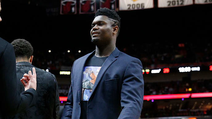 MIAMI, FLORIDA - NOVEMBER 16: Zion Williamson #1 of the New Orleans Pelicans looks on during a timeout against the Miami Heat during the first half at American Airlines Arena on November 16, 2019 in Miami, Florida. NOTE TO USER: User expressly acknowledges and agrees that, by downloading and/or using this photograph, user is consenting to the terms and conditions of the Getty Images License Agreement. (Photo by Michael Reaves/Getty Images) MIAMI, FLORIDA - NOVEMBER 16: Zion Williamson #1 of the New Orleans Pelicans looks on during a timeout against the Miami Heat during the first half at American Airlines Arena on November 16, 2019 in Miami, Florida. NOTE TO USER: User expressly acknowledges and agrees that, by downloading and/or using this photograph, user is consenting to the terms and conditions of the Getty Images License Agreement. (Photo by Michael Reaves/Getty Images)