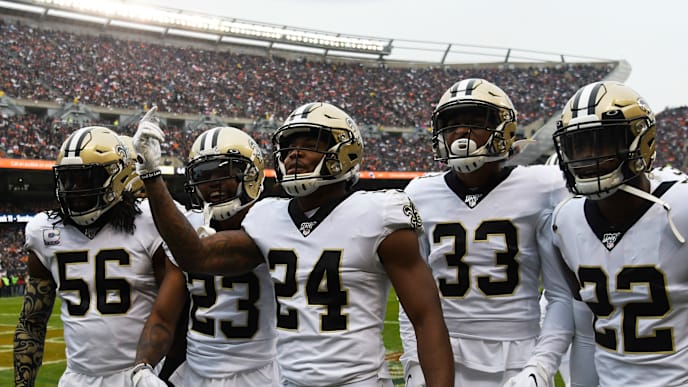 CHICAGO, ILLINOIS - OCTOBER 20: The New Orleans Saints defense celebrate a fumble recovery at Soldier Field on October 20, 2019 in Chicago, Illinois. (Photo by David Banks/Getty Images) CHICAGO, ILLINOIS - OCTOBER 20: The New Orleans Saints defense celebrate a fumble recovery at Soldier Field on October 20, 2019 in Chicago, Illinois. (Photo by David Banks/Getty Images)
