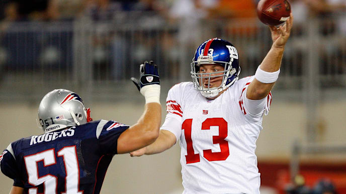 FOXBORO, MA - AUGUST 30: Justin Rogers #51 of the New England Patriots presses Jared Lorenzen #13 of the New York Giants at the Gilette Stadium on August 29, 2007 in Foxboro, Massachusetts. (Photo by Jim Rogash/Getty Images) FOXBORO, MA - AUGUST 30: Justin Rogers #51 of the New England Patriots presses Jared Lorenzen #13 of the New York Giants at the Gilette Stadium on August 29, 2007 in Foxboro, Massachusetts. (Photo by Jim Rogash/Getty Images)
