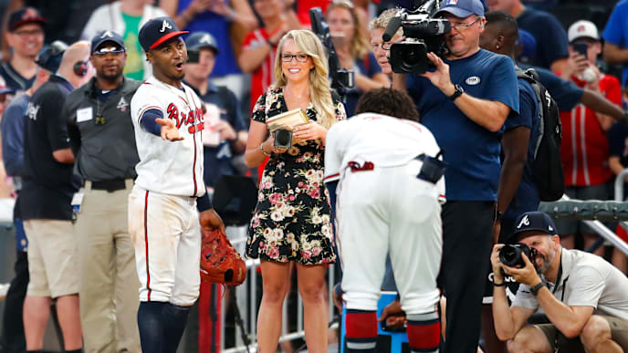 ATLANTA, GA - JUNE 17: Ozzie Albies #1 of the Atlanta Braves catches Ronald Acuna Jr. #13 attempting to dunk him at the conclusion of an MLB game against the New York Mets at SunTrust Park on June 17, 2019 in Atlanta, Georgia. (Photo by Todd Kirkland/Getty Images) ATLANTA, GA - JUNE 17: Ozzie Albies #1 of the Atlanta Braves catches Ronald Acuna Jr. #13 attempting to dunk him at the conclusion of an MLB game against the New York Mets at SunTrust Park on June 17, 2019 in Atlanta, Georgia. (Photo by Todd Kirkland/Getty Images)