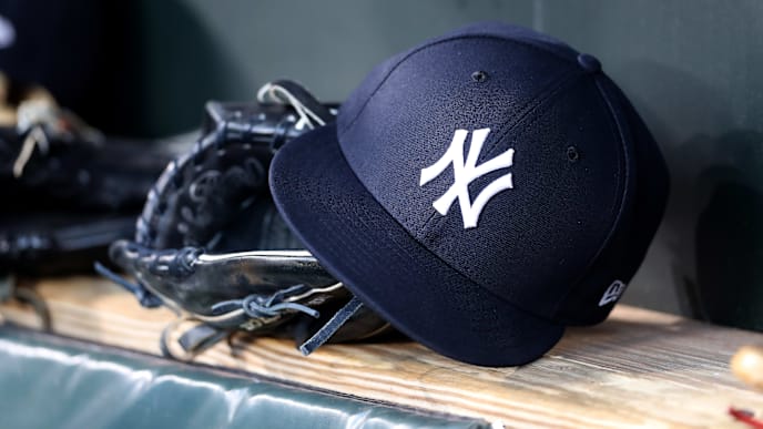 BALTIMORE, MARYLAND - APRIL 06: A New York Yankees hat and glove sit in the dugout before the start of the Yankees and Baltimore Orioles game at Oriole Park at Camden Yards on April 06, 2019 in Baltimore, Maryland. (Photo by Rob Carr/Getty Images) BALTIMORE, MARYLAND - APRIL 06: A New York Yankees hat and glove sit in the dugout before the start of the Yankees and Baltimore Orioles game at Oriole Park at Camden Yards on April 06, 2019 in Baltimore, Maryland. (Photo by Rob Carr/Getty Images)