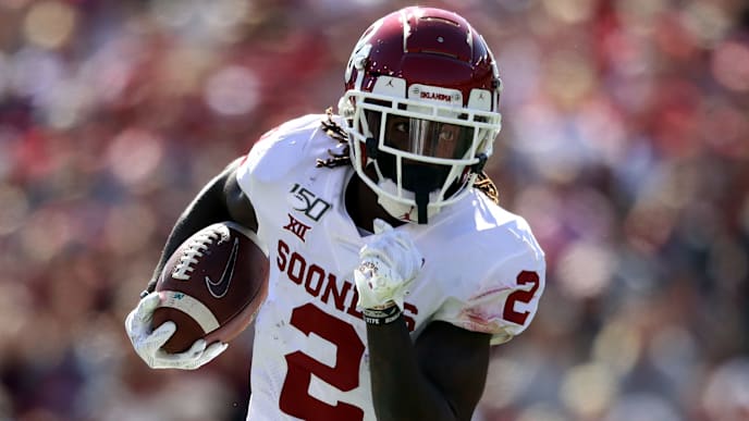 DALLAS, TEXAS - OCTOBER 12: CeeDee Lamb #2 of the Oklahoma Sooners runs the ball against the Texas Longhorns in the second quarter during the 2019 AT&T Red River Showdown at Cotton Bowl on October 12, 2019 in Dallas, Texas. (Photo by Ronald Martinez/Getty Images) DALLAS, TEXAS - OCTOBER 12: CeeDee Lamb #2 of the Oklahoma Sooners runs the ball against the Texas Longhorns in the second quarter during the 2019 AT&T Red River Showdown at Cotton Bowl on October 12, 2019 in Dallas, Texas. (Photo by Ronald Martinez/Getty Images)