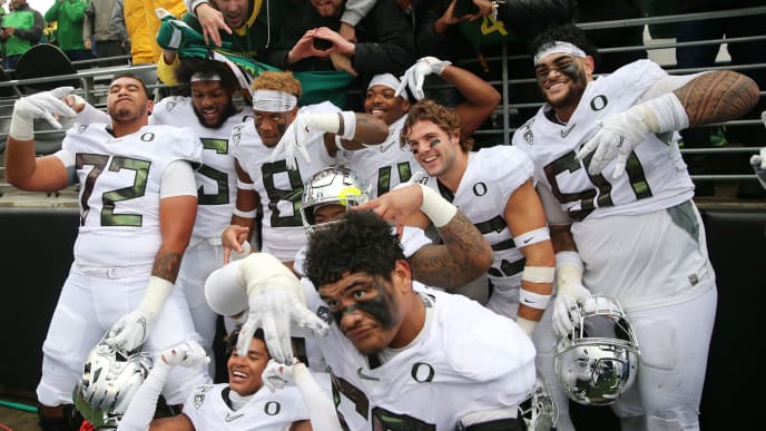 SEATTLE, WASHINGTON - OCTOBER 19: The Oregon Ducks celebrate after defeating the Washington Huskies 35-31 during their game at Husky Stadium on October 19, 2019 in Seattle, Washington. (Photo by Abbie Parr/Getty Images) SEATTLE, WASHINGTON - OCTOBER 19: The Oregon Ducks celebrate after defeating the Washington Huskies 35-31 during their game at Husky Stadium on October 19, 2019 in Seattle, Washington. (Photo by Abbie Parr/Getty Images)