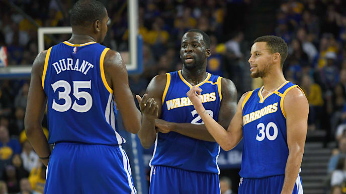 OAKLAND, CA - NOVEMBER 13: Stephen Curry #30, Kevin Durant #35 and Draymond Green #23 of the Golden State Warriors talks while there's a break in the action against the Phoenix Suns during an NBA basketball game at ORACLE Arena on November 13, 2016 in Oakland, California. NOTE TO USER: User expressly acknowledges and agrees that, by downloading and or using this photograph, User is consenting to the terms and conditions of the Getty Images License Agreement. (Photo by Thearon W. Henderson/Getty Images) OAKLAND, CA - NOVEMBER 13: Stephen Curry #30, Kevin Durant #35 and Draymond Green #23 of the Golden State Warriors talks while there's a break in the action against the Phoenix Suns during an NBA basketball game at ORACLE Arena on November 13, 2016 in Oakland, California. NOTE TO USER: User expressly acknowledges and agrees that, by downloading and or using this photograph, User is consenting to the terms and conditions of the Getty Images License Agreement. (Photo by Thearon W. Henderson/Getty Images)