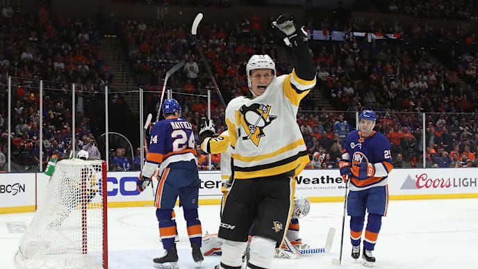 UNIONDALE, NEW YORK - APRIL 10: Nick Bjugstad #27 of the Pittsburgh Penguins celebrates a first period goal by Phil Kessel #81 against Robin Lehner #40 of the New York Islanders in Game One of the Eastern Conference First Round during the 2019 NHL Stanley Cup Playoffs at NYCB Live's Nassau Coliseum on April 10, 2019 in Uniondale, New York. (Photo by Bruce Bennett/Getty Images) UNIONDALE, NEW YORK - APRIL 10: Nick Bjugstad #27 of the Pittsburgh Penguins celebrates a first period goal by Phil Kessel #81 against Robin Lehner #40 of the New York Islanders in Game One of the Eastern Conference First Round during the 2019 NHL Stanley Cup Playoffs at NYCB Live's Nassau Coliseum on April 10, 2019 in Uniondale, New York. (Photo by Bruce Bennett/Getty Images)