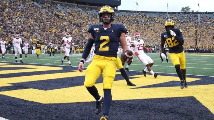 ANN ARBOR, MICHIGAN - SEPTEMBER 28: Shea Patterson #2 of the Michigan Wolverines scores a first quarter touchdown while playing the Rutgers Scarlet Knights at Michigan Stadium on September 28, 2019 in Ann Arbor, Michigan. (Photo by Gregory Shamus/Getty Images) ANN ARBOR, MICHIGAN - SEPTEMBER 28: Shea Patterson #2 of the Michigan Wolverines scores a first quarter touchdown while playing the Rutgers Scarlet Knights at Michigan Stadium on September 28, 2019 in Ann Arbor, Michigan. (Photo by Gregory Shamus/Getty Images)