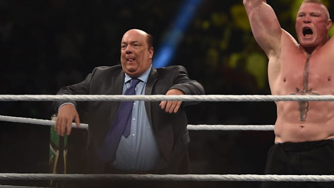 Brock Lesnar celebrates, with his manager Paul Heyman, after winning the WWE Universal Championship match as part of as part of the World Wrestling Entertainment (WWE) Crown Jewel pay-per-view at the King Saud University Stadium in Riyadh on November 2, 2018. (Photo by Fayez Nureldine / AFP) (Photo credit should read FAYEZ NURELDINE/AFP/Getty Images) Brock Lesnar celebrates, with his manager Paul Heyman, after winning the WWE Universal Championship match as part of as part of the World Wrestling Entertainment (WWE) Crown Jewel pay-per-view at the King Saud University Stadium in Riyadh on November 2, 2018. (Photo by Fayez Nureldine / AFP) (Photo credit should read FAYEZ NURELDINE/AFP/Getty Images)