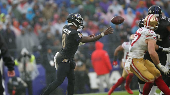 Lamar Jackson tosses a pass in Ravens vs 49ers Lamar Jackson tosses a pass in Ravens vs 49ers