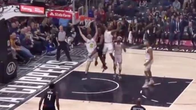 Kawhi Leonard dunks over Golden State Warriors rookies Eric Paschall and Alen Smailagic Kawhi Leonard dunks over Golden State Warriors rookies Eric Paschall and Alen Smailagic